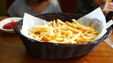 detail shot of french fries on table