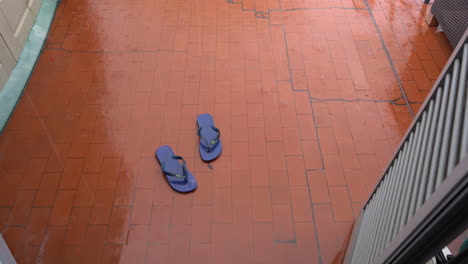 Heavy-rain-falling-on-the-balcony-of-a-house