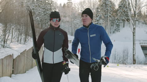 couple enjoying cross-country skiing in the winter