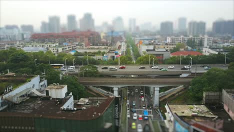 day time wuhan cityscape traffic road junction aerial top view 4k tilt shift china