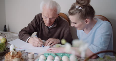 grandfather writing letter during easter holidays 1