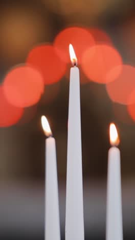 candles flame close up in church