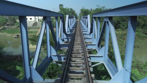 railway bridge, symmetrical structure drone fast fly through