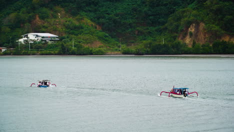 Passengers-travel-on-traditional-boat-near-port-of-Lembar-in-Lombok,-aerial-view