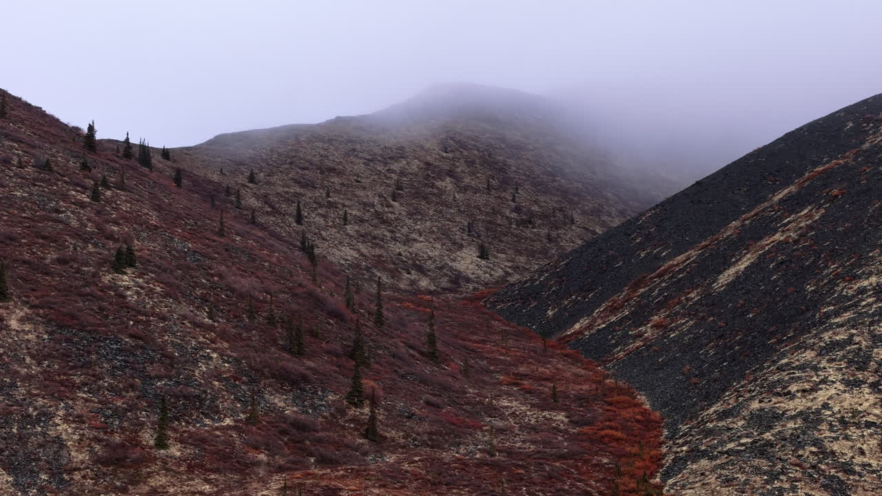 Ogilvie Mountain Range During Fall Near Dempster Highway In Yukon, Canada - Drone Shot