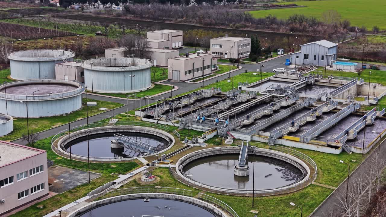 Rural water treatment facility with multiple tanks and buildings