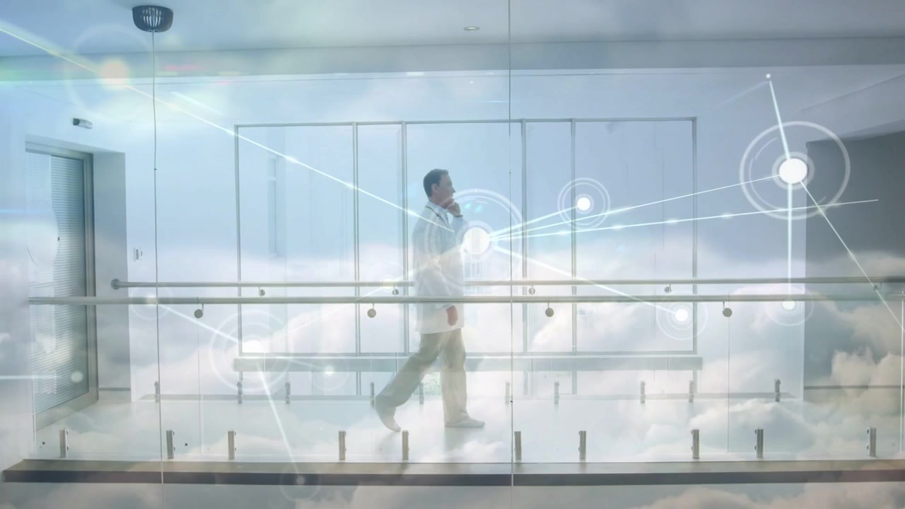 Doctor checking phone calling while walking ward activating cloud overlay and coordinating care