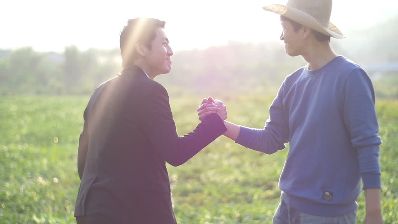 Farmer And Businessman Shaking Hands, Partners