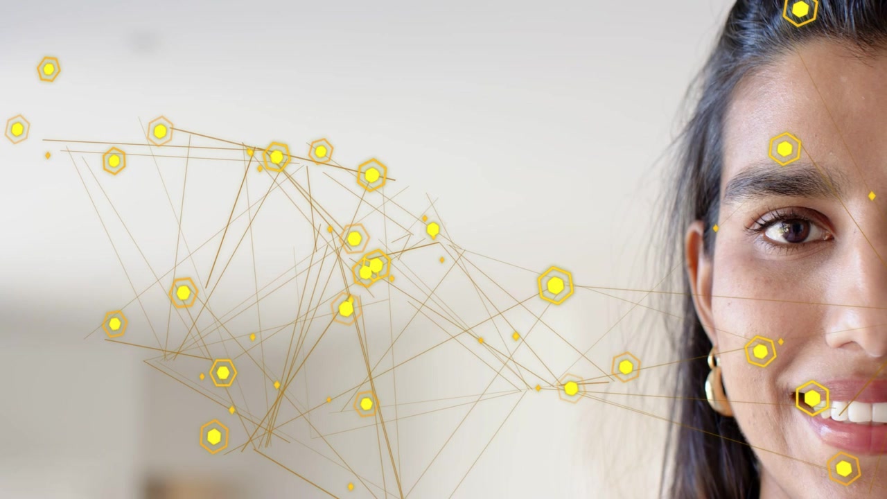 Vertical video: Mid adult woman holding gaze while yellow nodes appearing, mapping face for tech