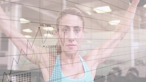 Animation-of-statistical-data-processing-over-caucasian-fit-woman-working-out-with-dumbbells-at-gym