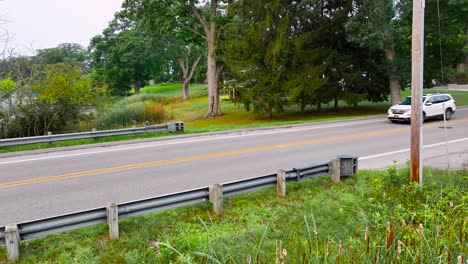 Drone-clip-of-old-school-road-barriers-against-a-low-point