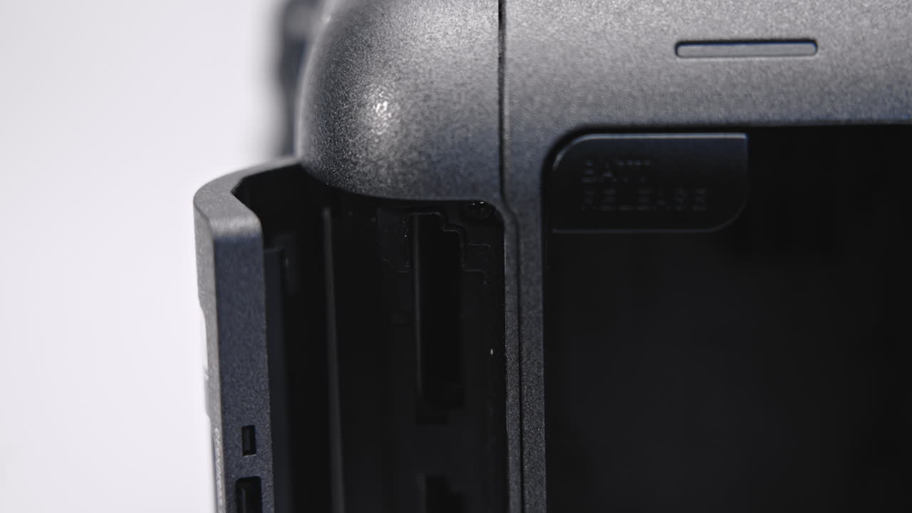 ejecting memory card from video film camera