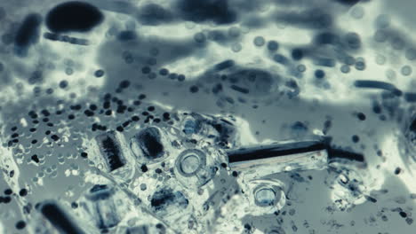 microscopic abstract of glitter and metal components
