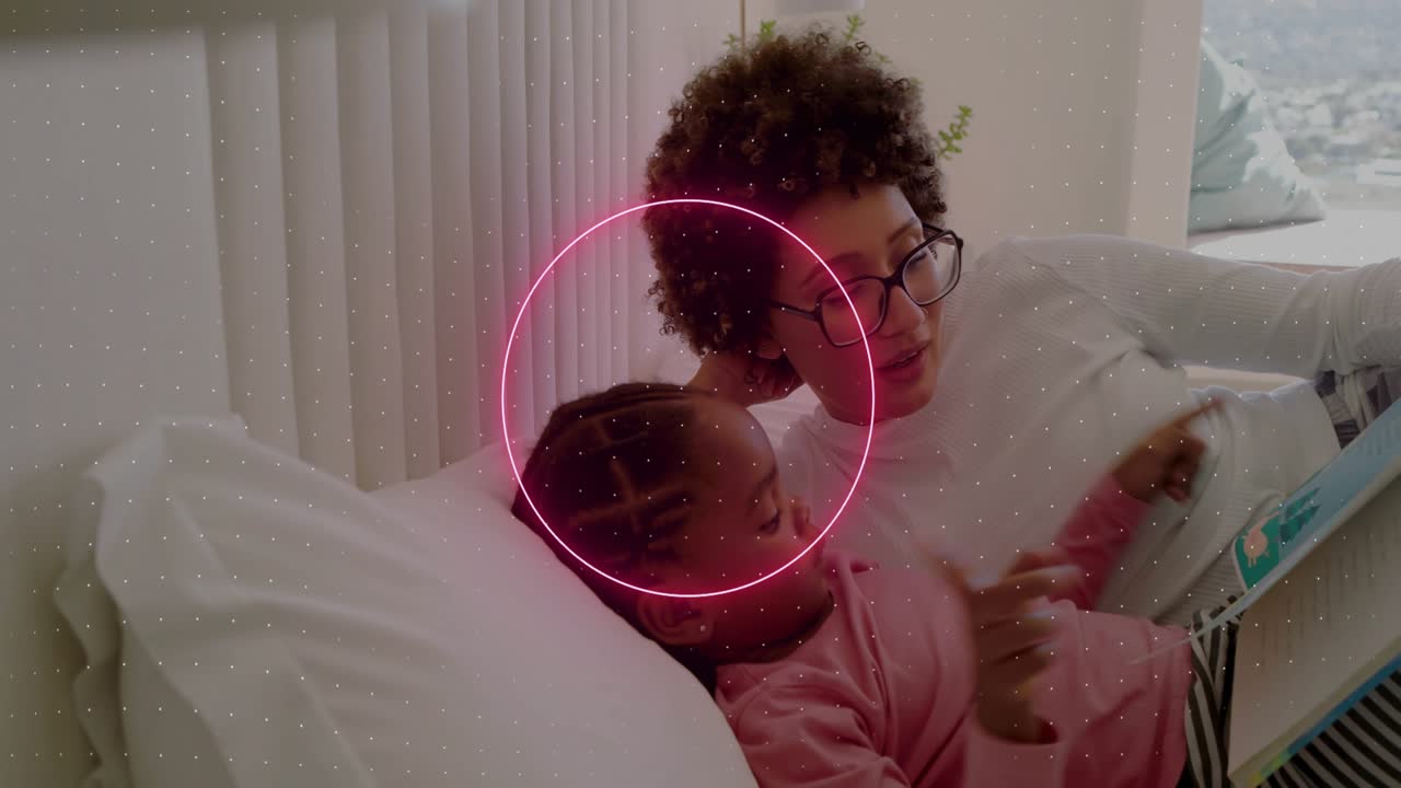 Adult woman reading picture book, turning pages, neon shapes guiding child focus for education