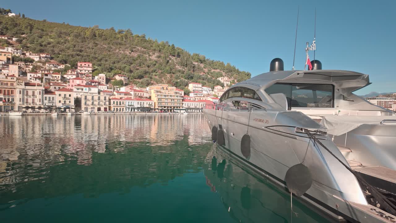 Luxury Yacht Docked in a Picturesque Mediterranean Harbor