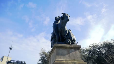 bronze statue of a mythological scene