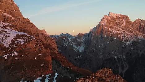 Cinematic-rotating-revealing-drone-shot-of-Mangart-Mountain-in-Slovenia