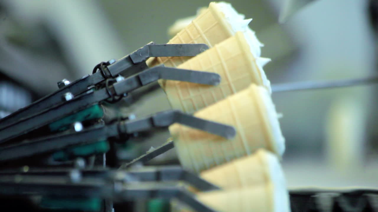 Food processing plant. Ice cream conveyor line. Industrial equipment