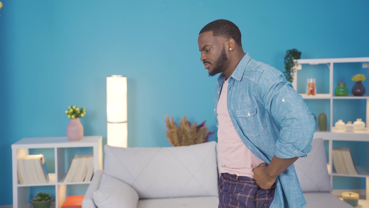 Sad african young man getting angry with himself.