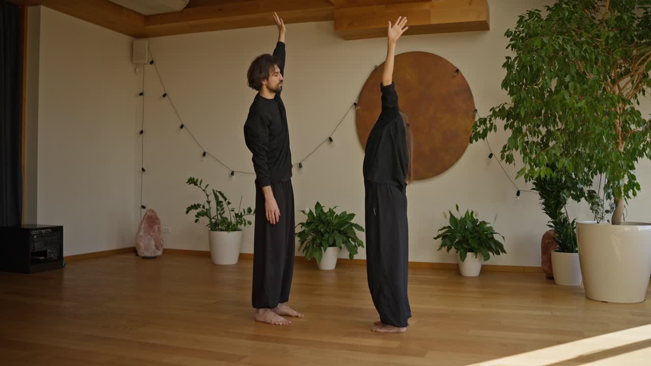 Couple Practicing Yoga Together