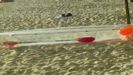 a crystal kayak on standby at the white sand beach of boracay