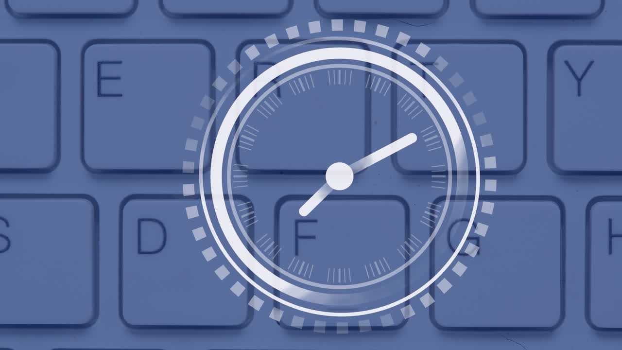 Animation of clock moving over laptop keyboard