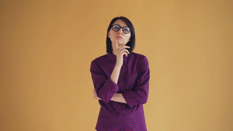 woman in plaid shirt and glasses
