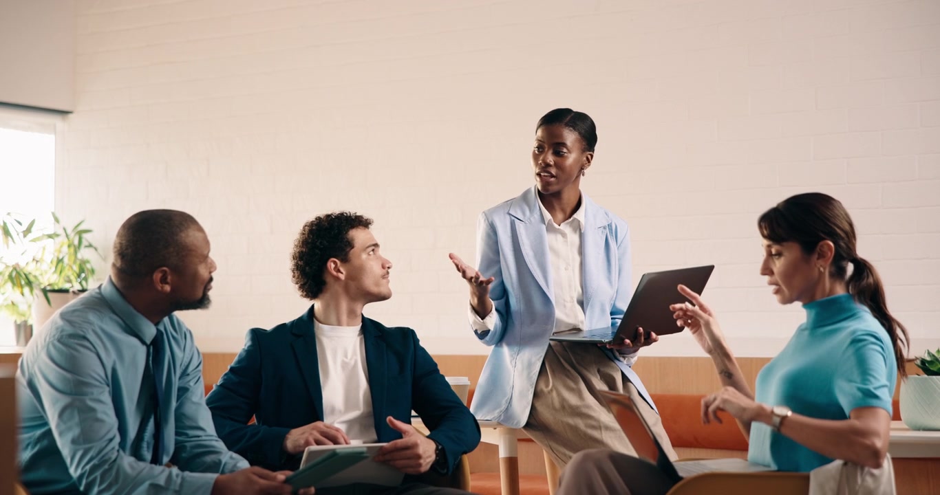 Diverse Business Team Collaborating in Modern Office Meeting
