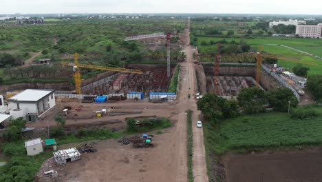 construction of a big building is going on in an urban city