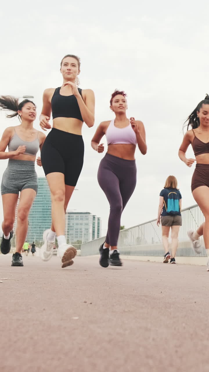 Four Women Running in the City