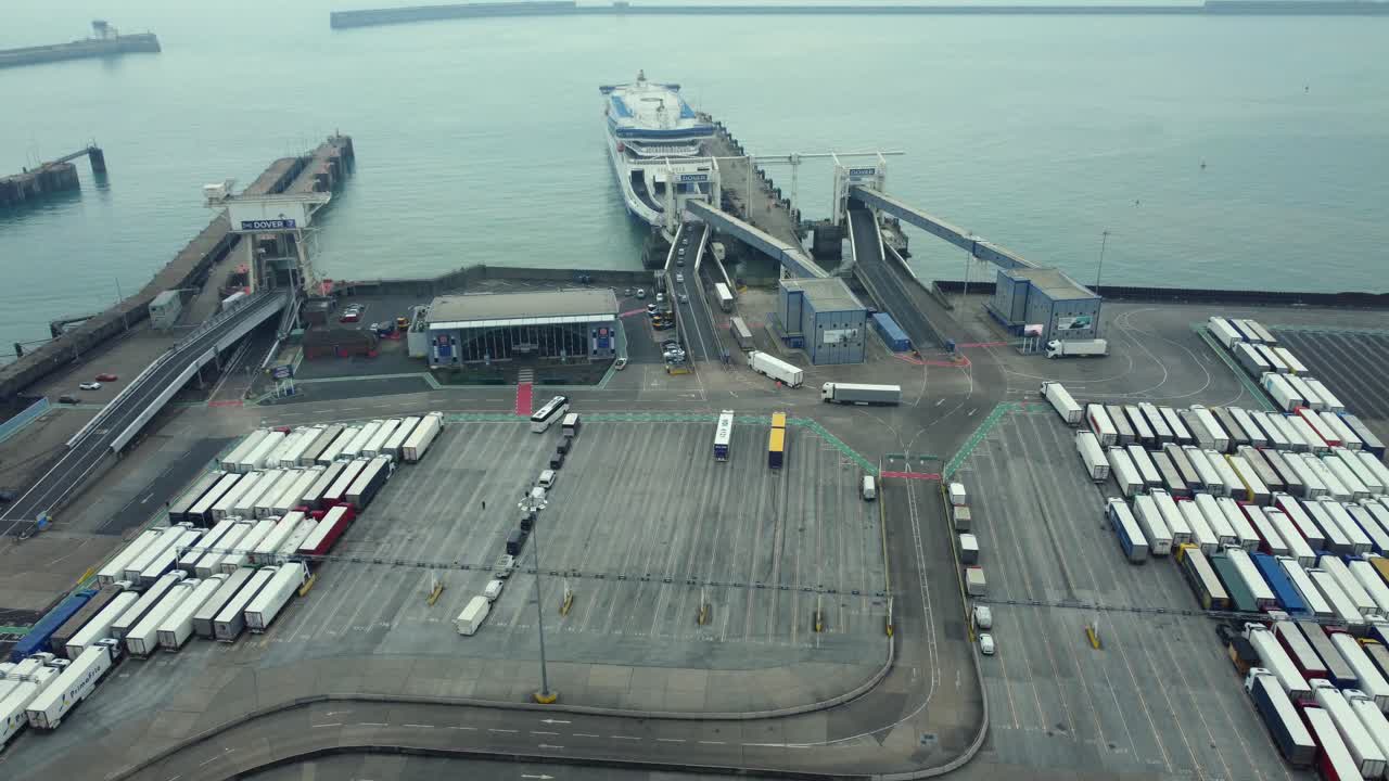 Aerial view of a port with ferry and trailers