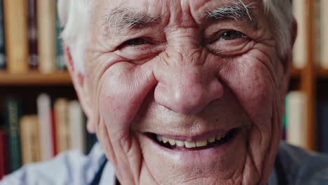 smiling senior man in a library