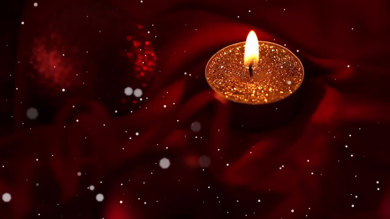 Animazione di punti di luce bianchi che si muovono su una candela tea light accesa, spenta