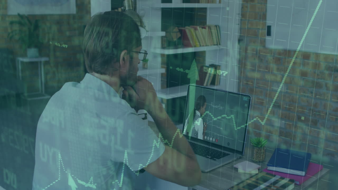 Man sitting at desk in modern office, analyzing laptop screen with animated financial charts