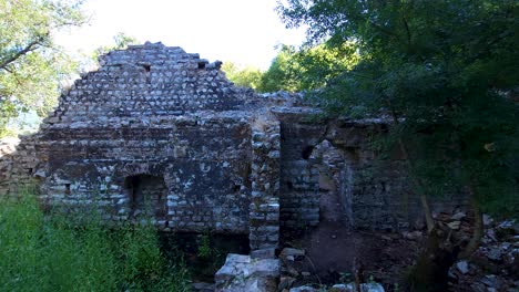 Remnants-of-Stone-Walls-Bear-Witness-to-the-Ancient-City-of-Butrint,-Unveiling-the-Tales-of-Archaeological-Time