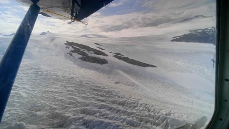 Glacier-in-Alaska-USA,-Airplane-Window-View