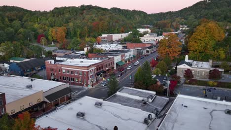 AERIAL-PUSH-OVER-TREETOPS-IN-FALL-IN-BOONE-NC,-NORTH-CAROLINA