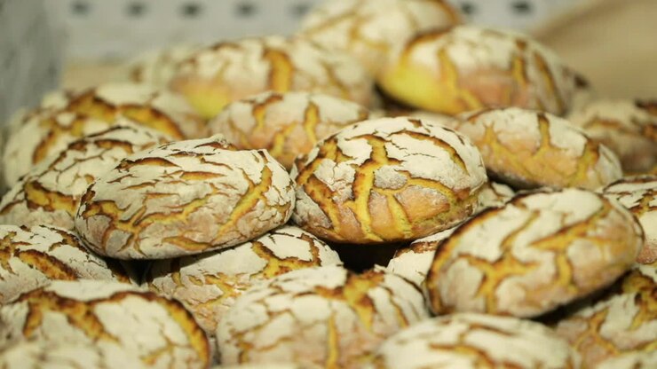 Stacked Of Freshly Baked Cookies On A Tray In the Bakery