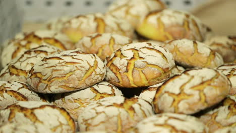 Stacked-Of-Freshly-Baked-Cookies-On-A-Tray-In-the-Bakery