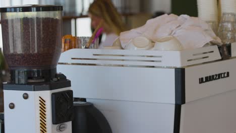 coffee machine in use at beachside cafe