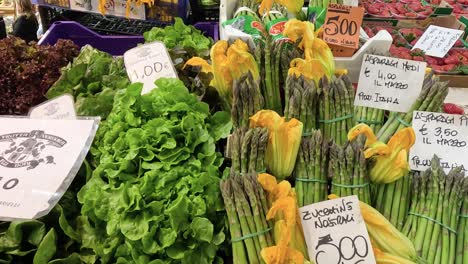 colorful display of vegetables at a busy market