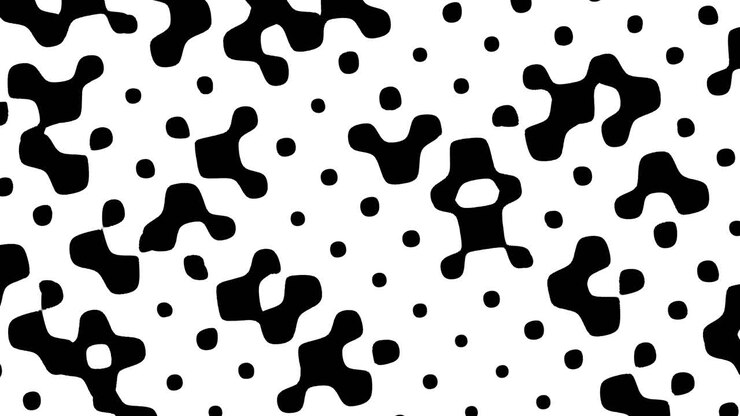 Abstract black and white dot pattern with varied sizes and irregular placement