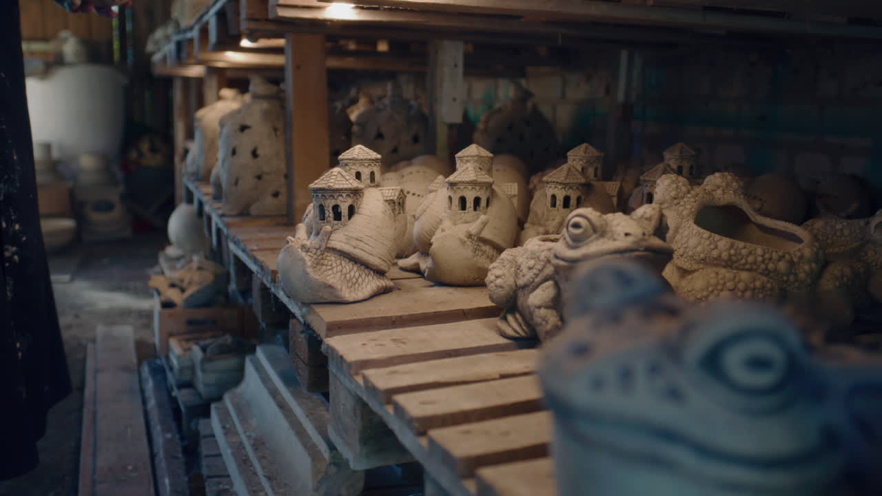 Artisan creating ceramic garden figurines