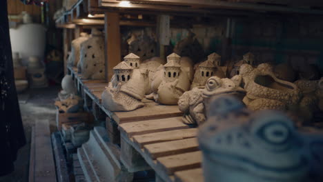 artisan creating ceramic garden figurines