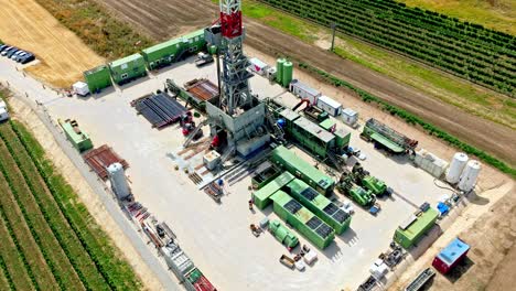 aerial view on oil or gas drilling company in austria - drone shot