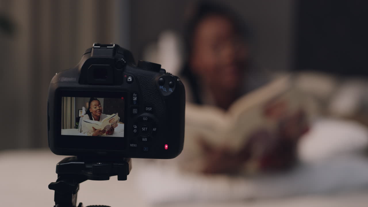 a young woman reading a children's book