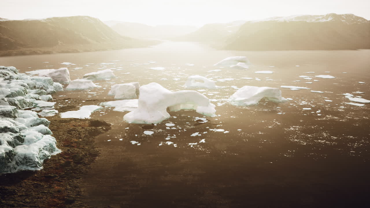 Stunning Aerial View of Icebergs in a Fjord