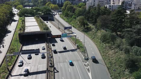 Urban-car-traffic-along-roads-of-Paris,-France