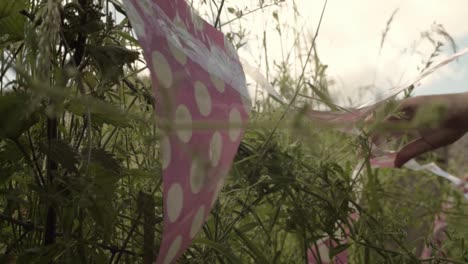 Woman-hanging-bunting-in-garden