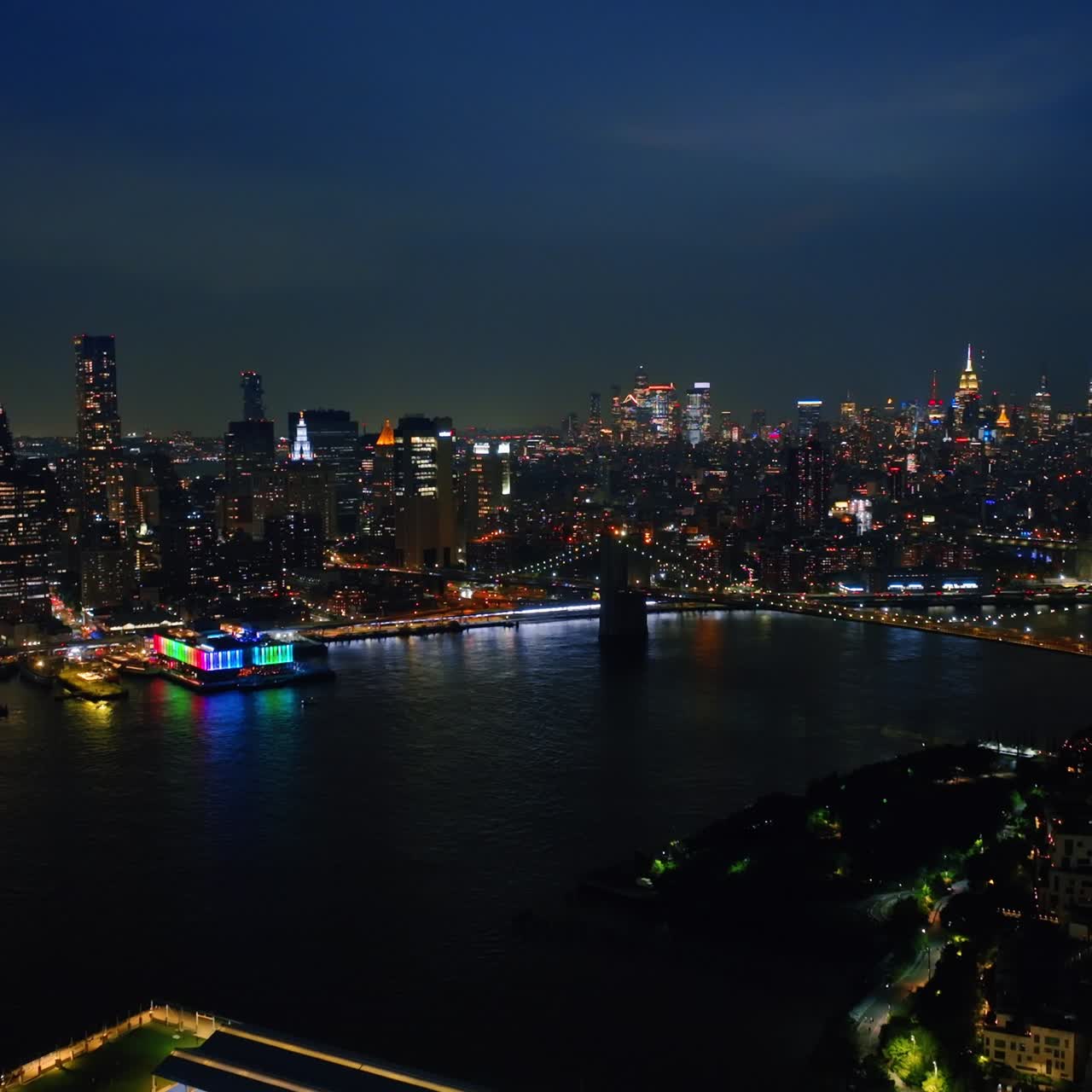 Urban Manhattan city skyscrapers. Aerial view of night New york city